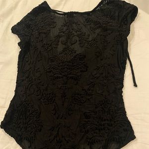 Black Women’s Bodysuit size Large polyester, spandex and nylon material